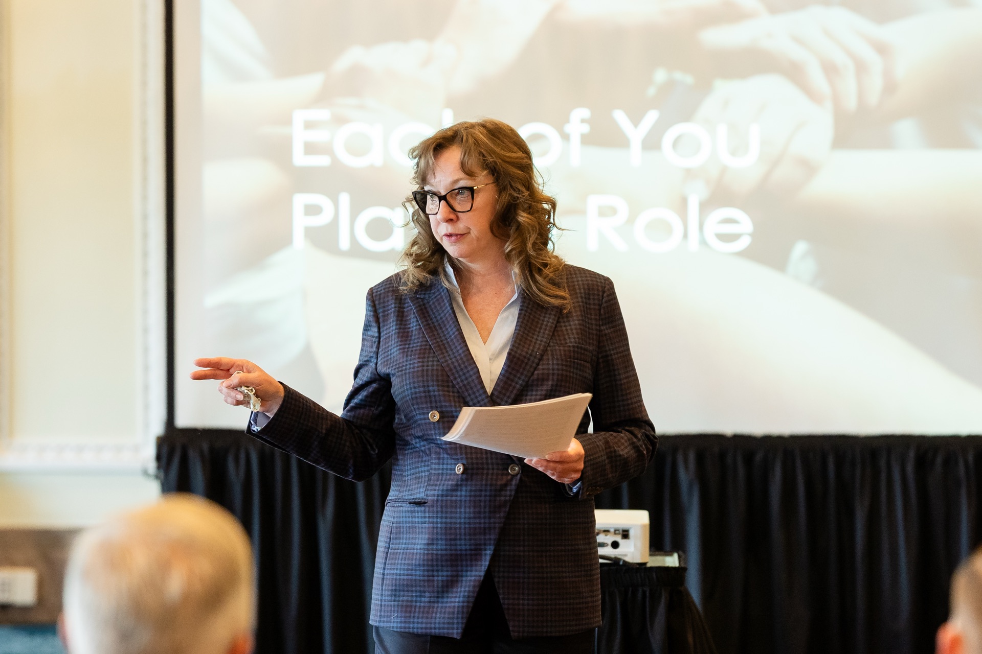 An Elevate advisor presenting to the team